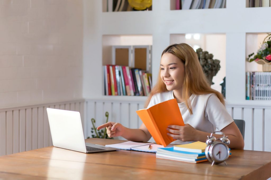 Young woman working on her statement of purpose